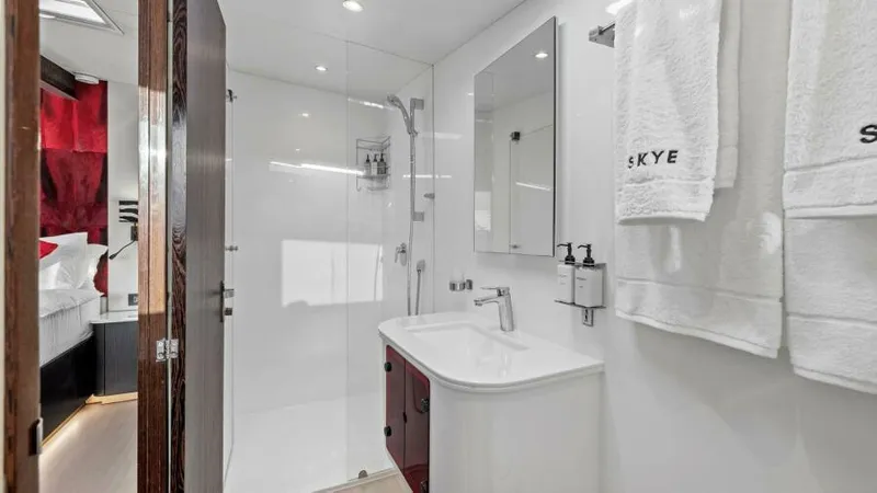 Skye Yacht Photos Pics Luxurious bathroom in 2023 Mystique Yachts Silhouette 800, featuring modern fixtures and elegant design.