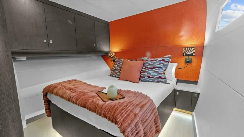 Skye Yacht Photos Pics Luxurious cabin interior of 2023 Mystique Yachts Silhouette 800 with modern decor.