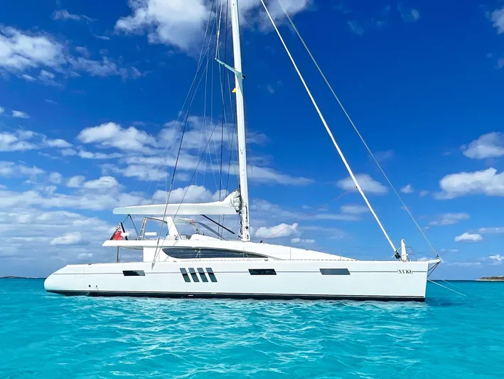 Skye Yacht Photos Pics Custom Mystique Yachts Silhouette 800 sailing on clear blue waters, 2023 model.