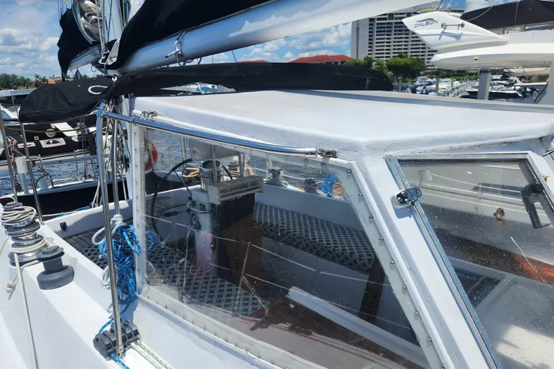 Cookie Monster Too Yacht Photos Pics 1982 Tayana Center Cockpit Cutter Ketch sailboat docked at marina, showcasing cockpit and rigging.