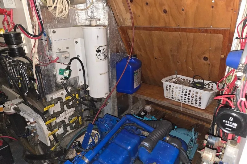 Cookie Monster Too Yacht Photos Pics Engine room of 1982 Tayana Center Cockpit Cutter Ketch with wiring and equipment.