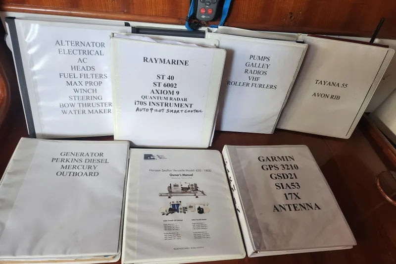 Cookie Monster Too Yacht Photos Pics Binders with manuals for Tayana Center Cockpit Cutter Ketch, 1982, featuring various equipment and systems.