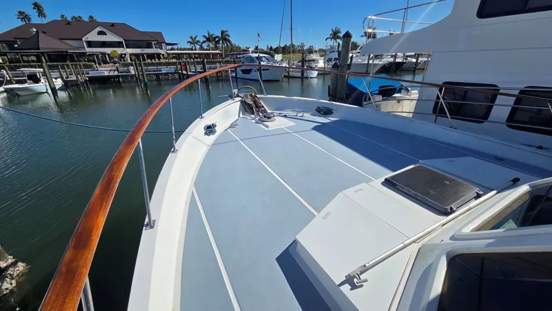 C U Later Yacht Photos Pics 1987 DeFever 48 Tri Cabin yacht docked in marina.
