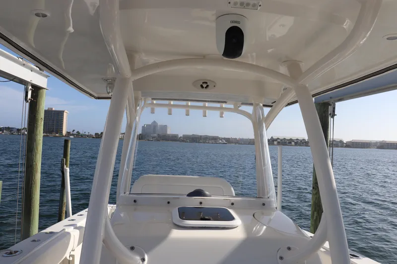  Yacht Photos Pics 2013 Jupiter 30 boat interior with ocean view and city skyline in background.