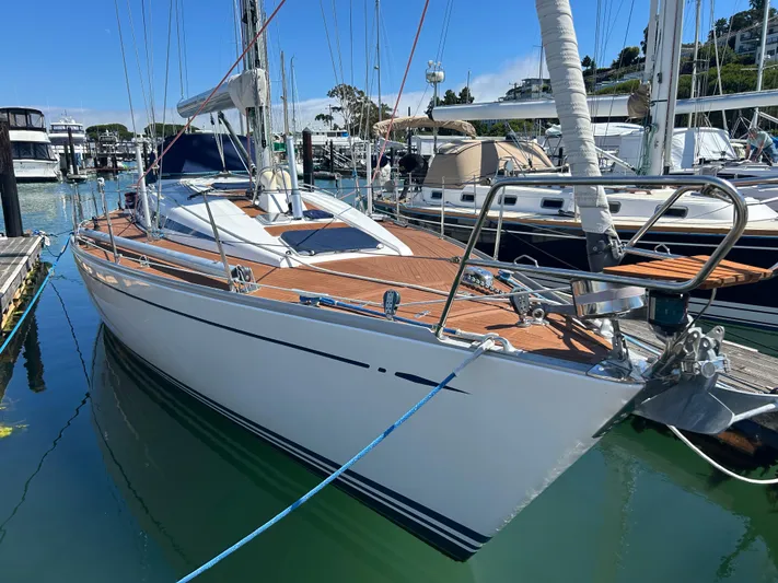 Kells Yacht Photos Pics Sailing yacht Nautor Swan 44 Mk II, 1996 model, docked in a marina.