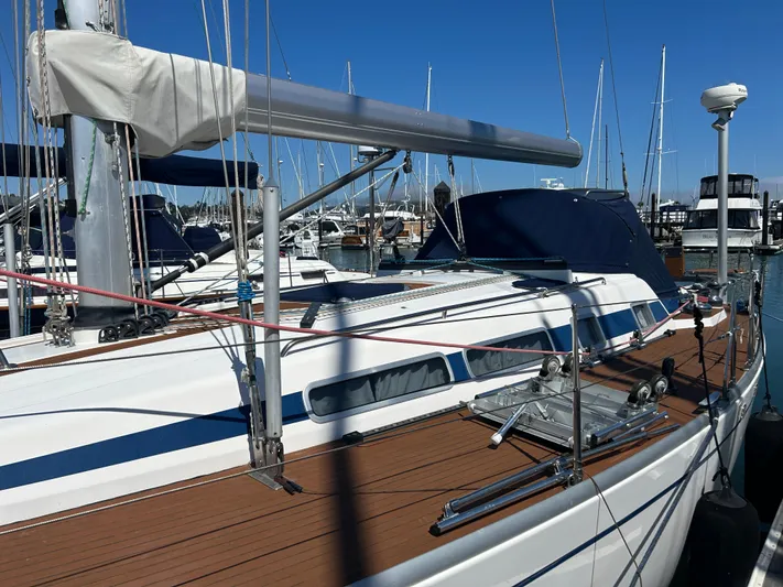 Kells Yacht Photos Pics Sailboat Nautor Swan 44 Mk II, 1996 model, docked at marina with clear blue sky.