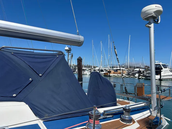 Kells Yacht Photos Pics Sailboat Nautor Swan 44 Mk II, 1996 model, docked in marina with clear blue sky.