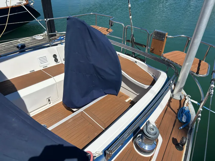 Kells Yacht Photos Pics Nautor Swan 44 Mk II yacht cockpit, 1996 model, with wooden deck and blue cover.