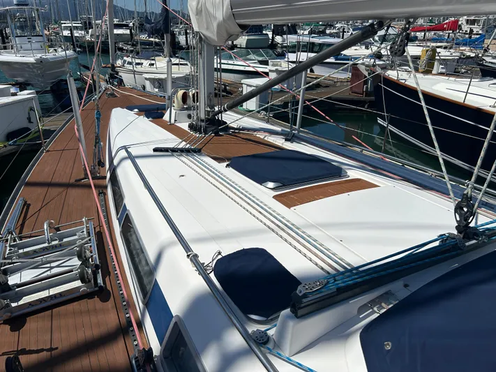 Kells Yacht Photos Pics Sailboat deck of 1996 Nautor Swan 44 Mk II in marina, featuring sleek design and rigging.