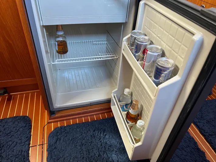 Kells Yacht Photos Pics Open fridge on Nautor Swan 44 Mk II yacht, stocked with drinks, 1996 model.