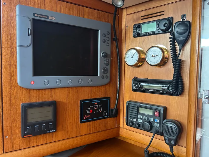 Kells Yacht Photos Pics Navigation equipment on a 1996 Nautor Swan 44 Mk II yacht, featuring Raymarine and Icom devices.