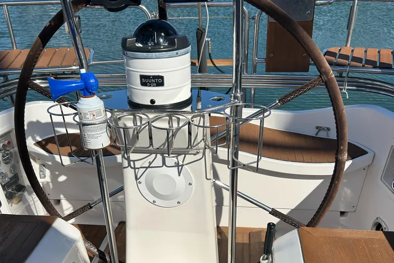 Kells Yacht Photos Pics Cockpit of 1996 Nautor Swan 44 Mk II sailboat with steering wheel and compass.