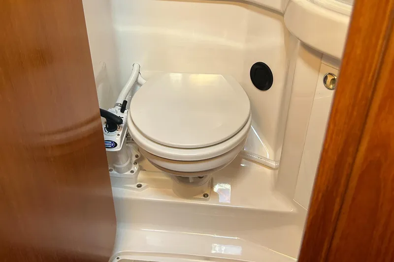 Kells Yacht Photos Pics Nautor Swan 44 Mk II 1996 yacht bathroom with compact marine toilet.