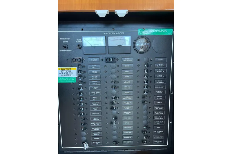  Yacht Photos Pics Control panel of 2003 Carver 444 Cockpit Motor Yacht with various switches and gauges.