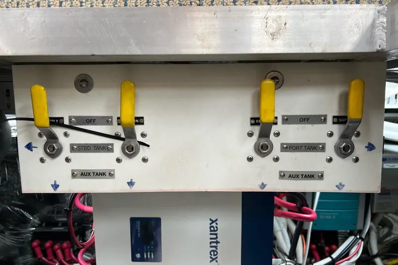  Yacht Photos Pics Control panel with yellow levers on a 2003 Carver 444 Cockpit Motor Yacht.