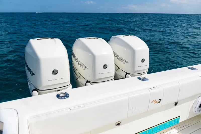  Yacht Photos Pics 2018 SeaVee 370Z boat with triple Mercury FourStroke engines on open water.