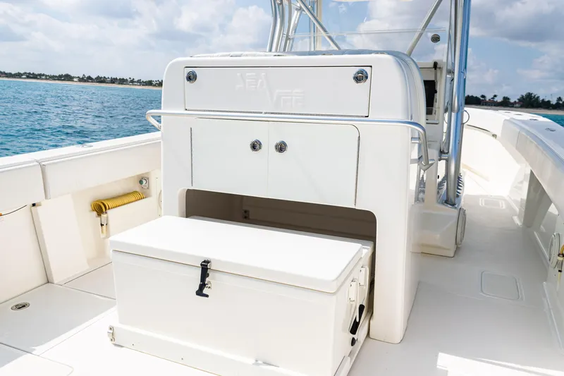  Yacht Photos Pics 2018 SeaVee 370Z boat interior with storage compartments, ocean view in background.