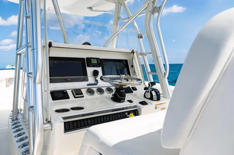  Yacht Photos Pics 2018 SeaVee 370Z boat helm with modern controls and ocean view.