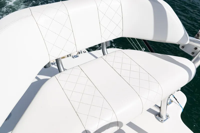  Yacht Photos Pics White leather seating on 2018 SeaVee 370Z boat, featuring diamond stitching.