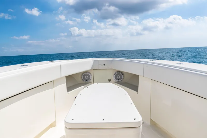  Yacht Photos Pics 2018 SeaVee 370Z boat deck with ocean view under blue sky.