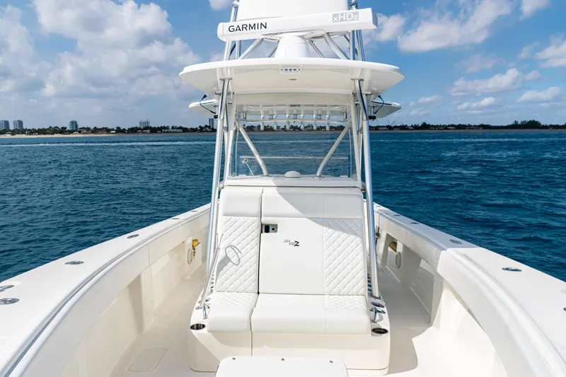  Yacht Photos Pics 2018 SeaVee 370Z boat on open water, featuring Garmin equipment and clear skies.