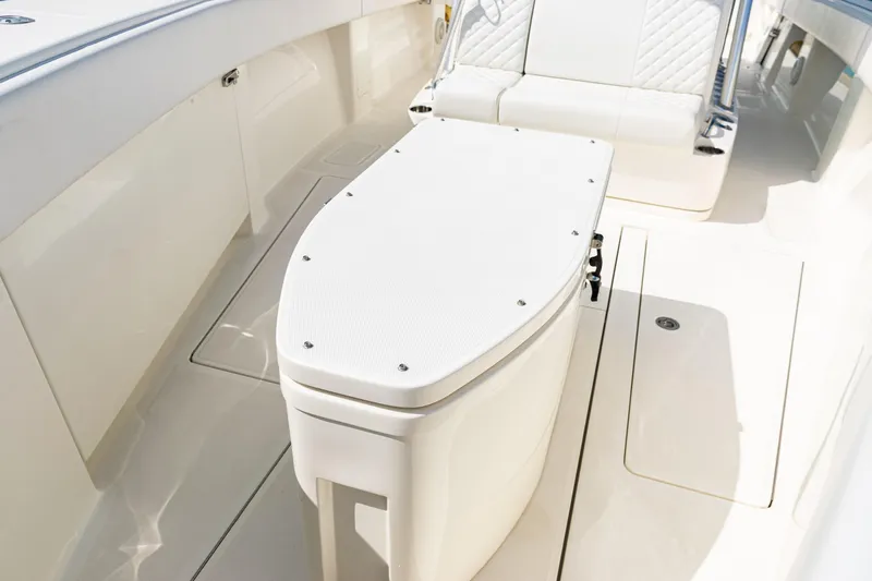  Yacht Photos Pics 2018 SeaVee 370Z boat interior with white seating and storage area.