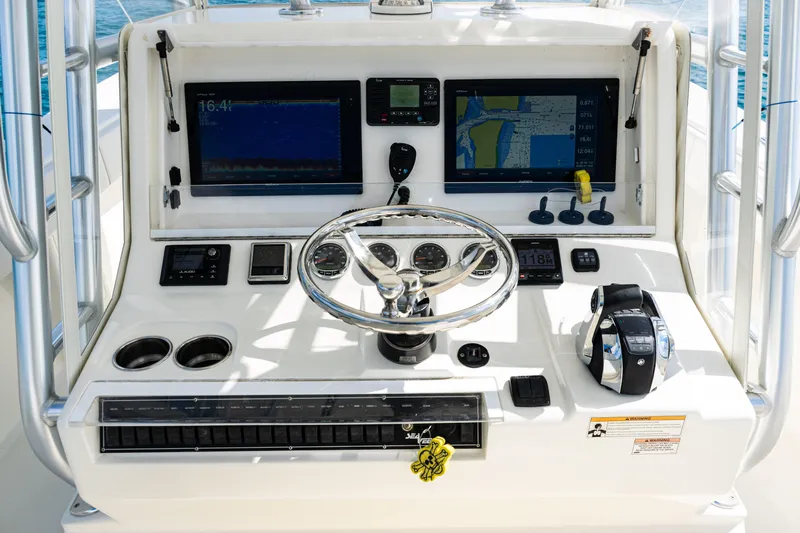  Yacht Photos Pics 2018 SeaVee 370Z boat dashboard with navigation screens and controls.