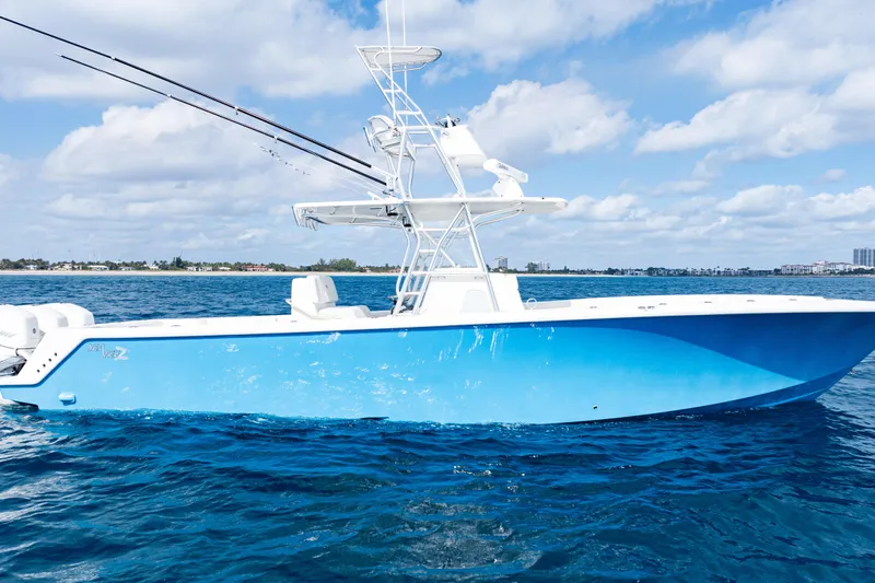  Yacht Photos Pics 2018 SeaVee 370Z boat on blue ocean under a partly cloudy sky.