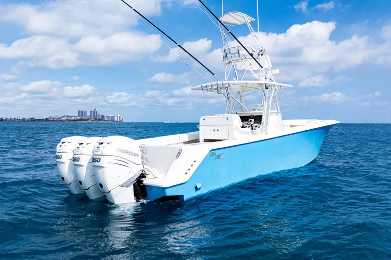  Yacht Photos Pics 2018 SeaVee 370Z boat with triple Mercury engines on open ocean.