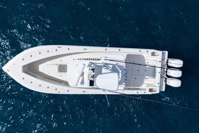  Yacht Photos Pics Aerial view of 2018 SeaVee 370Z boat on blue ocean water.