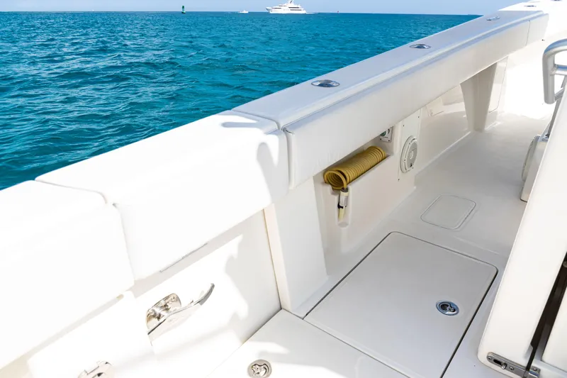  Yacht Photos Pics 2018 SeaVee 370Z boat deck with ocean view, featuring clean white surfaces.