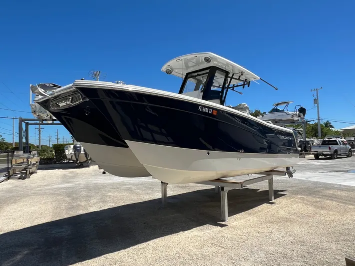  Yacht Photos Pics 2024 World Cat 260 CC-X boat on display, featuring sleek design and modern features.