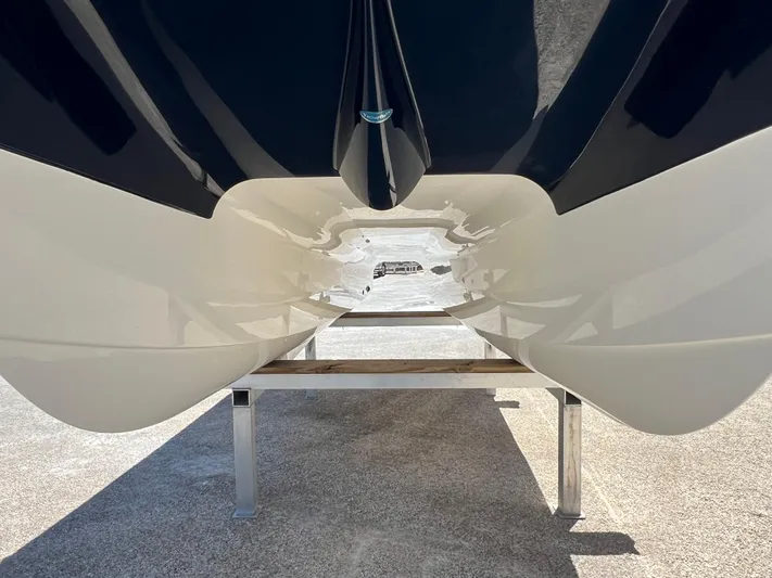 Yacht Photos Pics 2024 World Cat 260 CC-X catamaran hull on display stand.
