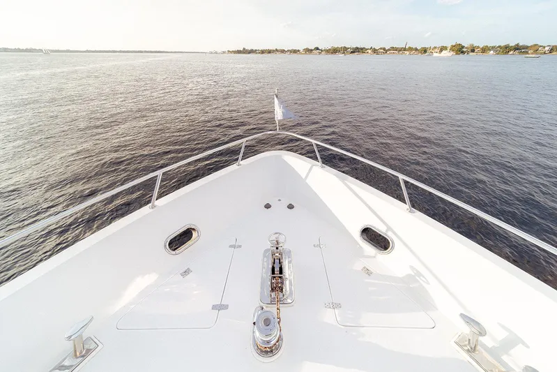 Dark Horse Yacht Photos Pics Bow view of 2007 Hargrave 78 Open Bridge yacht on calm waters.