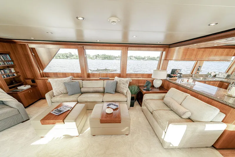 Dark Horse Yacht Photos Pics Luxurious interior of 2007 Hargrave 78 Open Bridge yacht with elegant seating and scenic views.