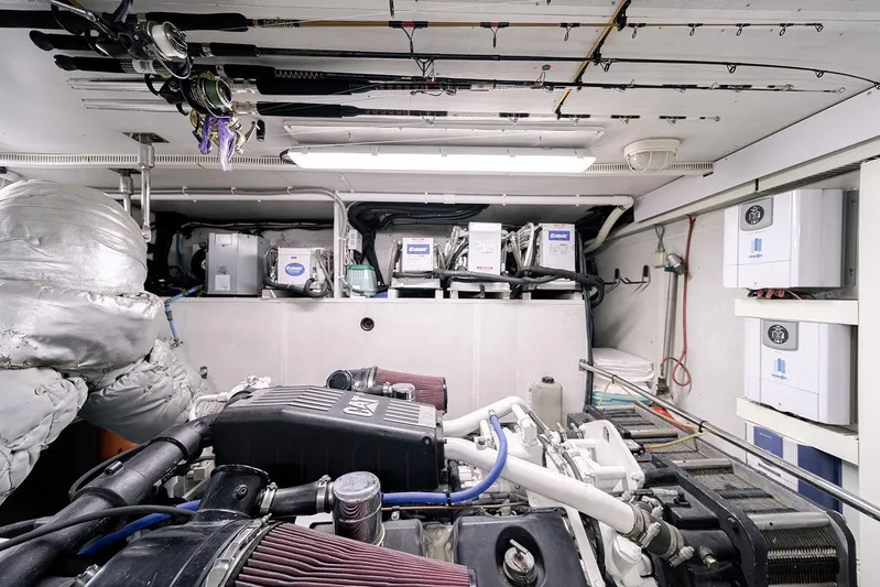 Dark Horse Yacht Photos Pics Engine room of 2007 Hargrave 78 Open Bridge yacht, showcasing machinery and equipment.