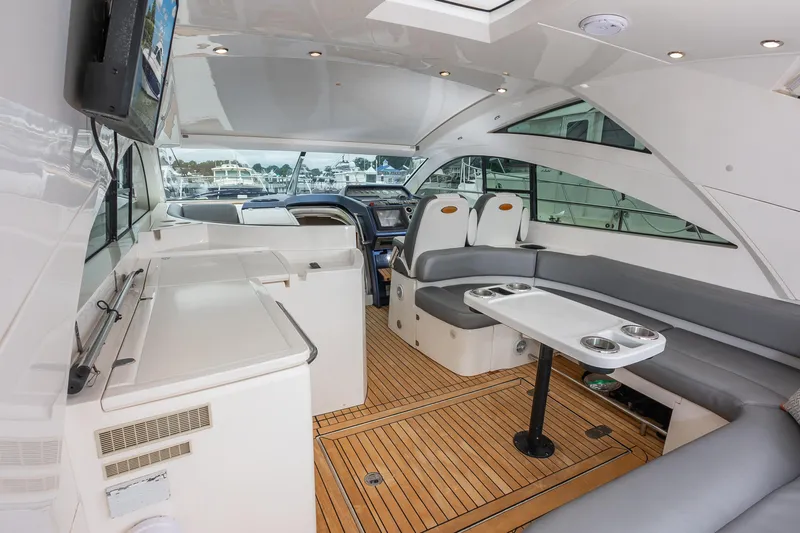 Ami Kids Donation: Meditrina Yacht Photos Pics Interior of 2006 Fairline Targa 47 GT yacht with modern seating and sleek design.