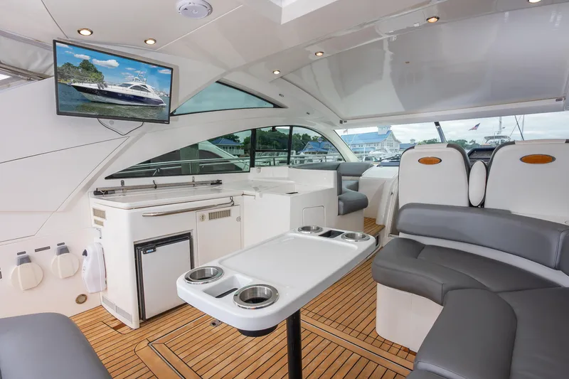 Ami Kids Donation: Meditrina Yacht Photos Pics Luxurious interior of 2006 Fairline Targa 47 GT yacht with modern amenities and sleek design.