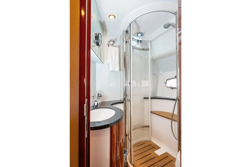 Ami Kids Donation: Meditrina Yacht Photos Pics Luxurious bathroom in 2006 Fairline Targa 47 GT yacht with modern shower and sink.