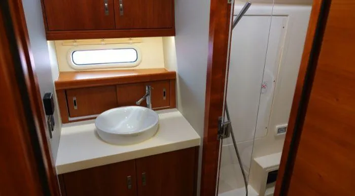 Heolia Yacht Photos Pics Luxurious bathroom in 2018 Hanse Moody 54 DS yacht with modern sink and shower.