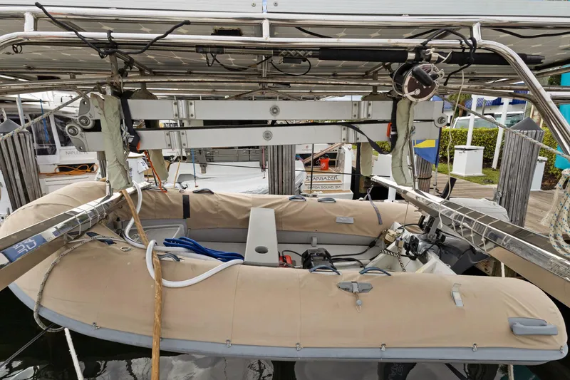 Clarity Yacht Photos Pics 2009 Hylas 54 yacht with dinghy and davit system at marina.