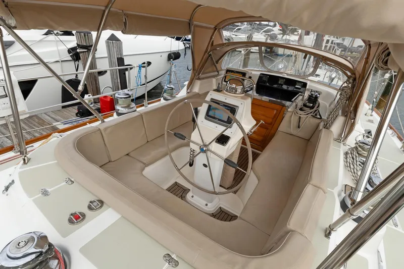 Clarity Yacht Photos Pics 2009 Hylas 54 yacht cockpit with steering wheel and navigation equipment.