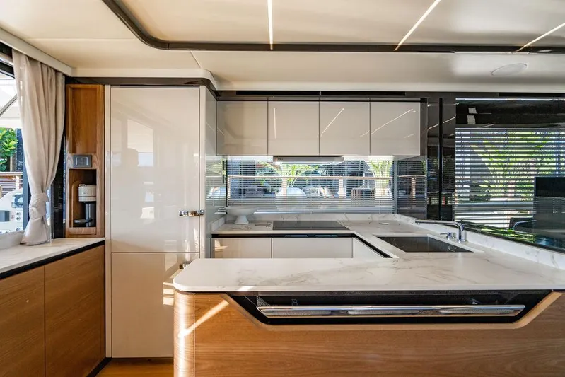 Kingship Yacht Photos Pics Luxurious kitchen interior of 2023 Absolute 64 Navetta yacht with modern design.