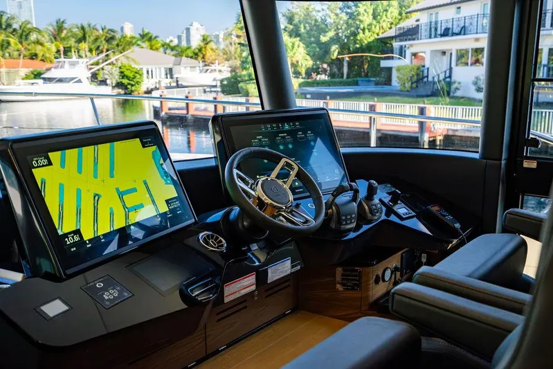 Kingship Yacht Photos Pics Cockpit of 2023 Absolute 64 Navetta yacht with advanced navigation systems.