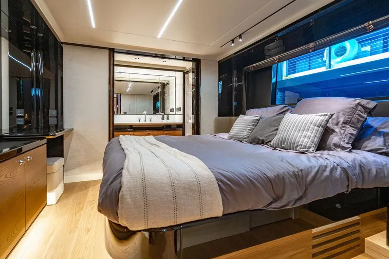 Kingship Yacht Photos Pics Luxurious bedroom interior of 2023 Absolute 64 Navetta yacht with modern design.