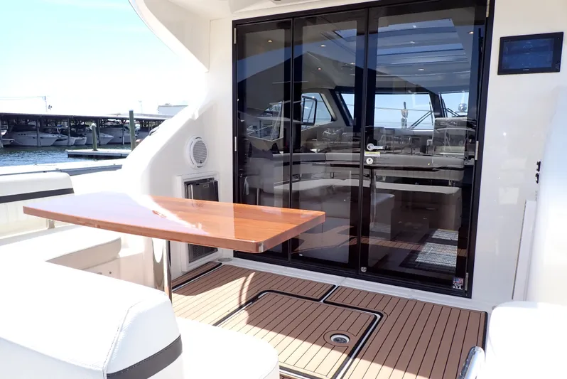 Yacht Photos Pics 2019 Carver C37 Coupe yacht with elegant deck and glass doors.