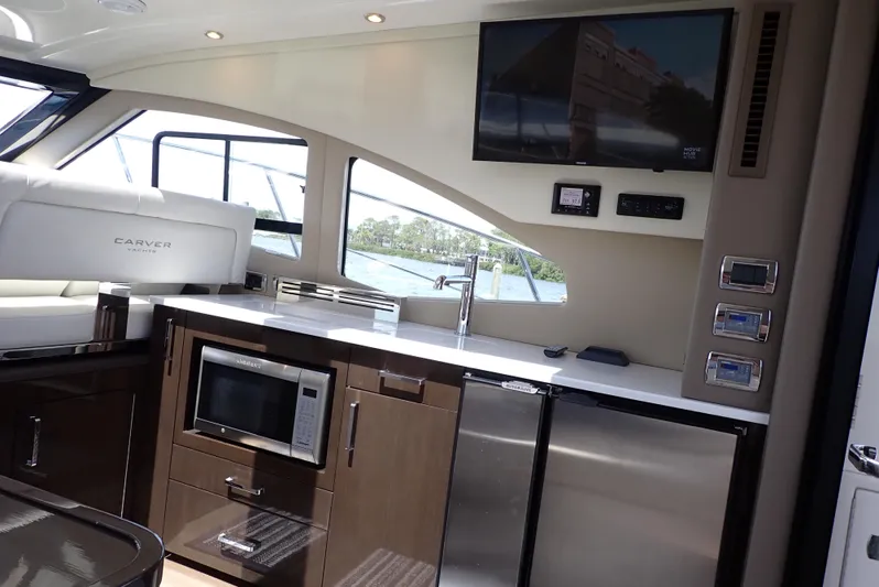  Yacht Photos Pics Interior of 2019 Carver C37 Coupe yacht with modern kitchen and appliances.