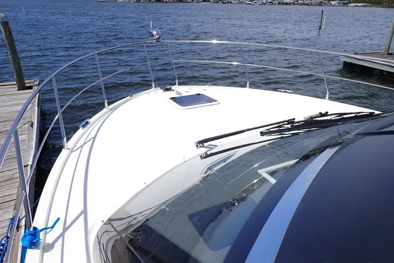  Yacht Photos Pics 2019 Carver C37 Coupe yacht docked by the water.
