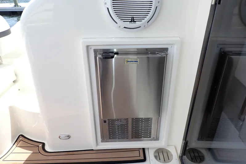  Yacht Photos Pics 2019 Carver C37 Coupe yacht with stainless steel outdoor refrigerator.