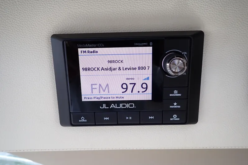  Yacht Photos Pics JL Audio stereo system in 2019 Carver C37 Coupe displaying FM radio station 97.9.